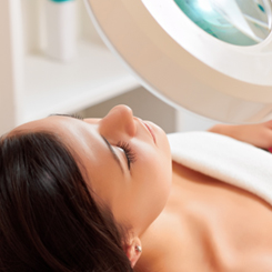 A woman undergoing cosmetic skin treatment