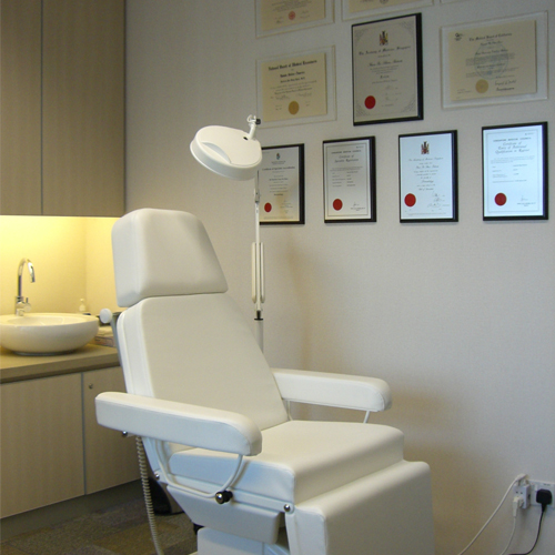 White treatment chair at Patricia Yuen dermatology Clinic in Singapore
