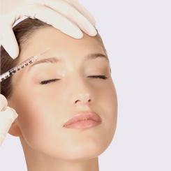 A Woman receiving a cosmetic injection on her forehead